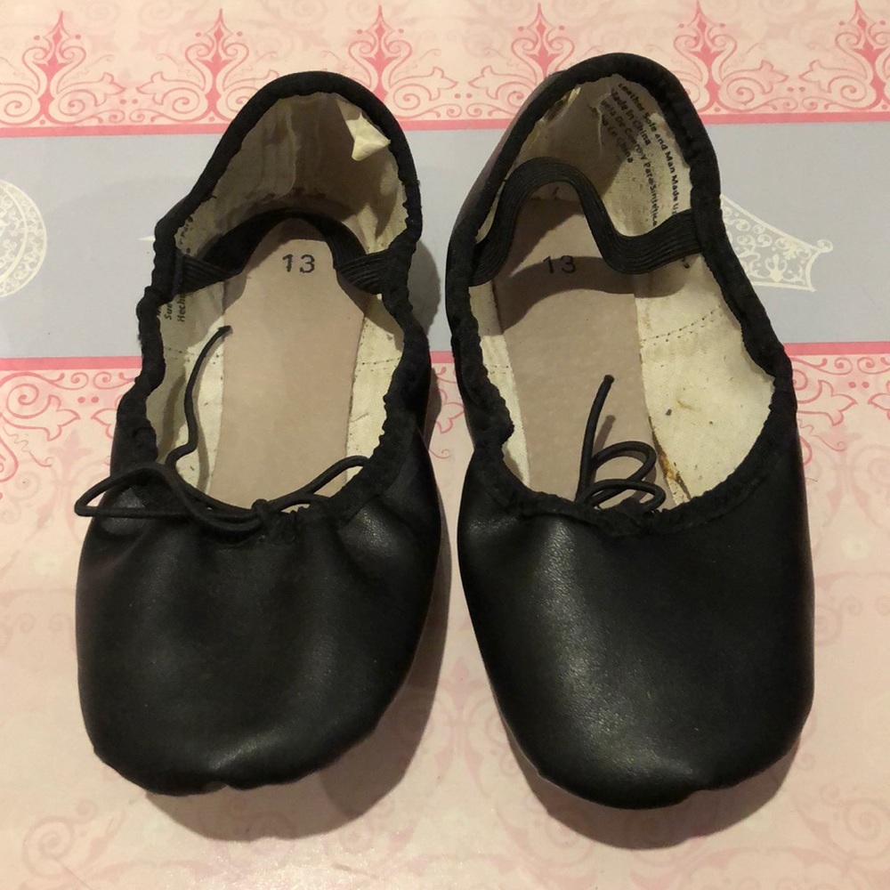 Black ballet slippers.Danskin company.